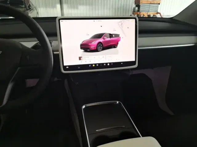 Tesla Model Y — Фото автомобиля 12