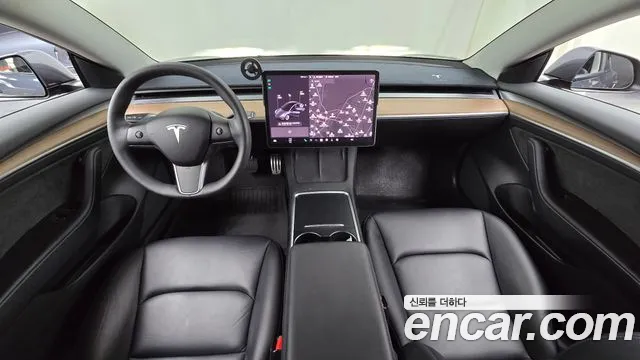 Tesla Model 3 — Фото автомобиля 7