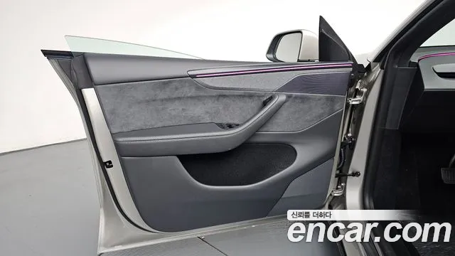 Tesla Model Y — Фото автомобиля 13
