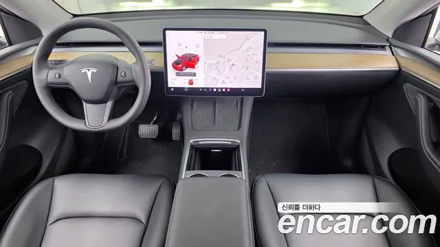 Tesla Model Y — Фото автомобиля 10