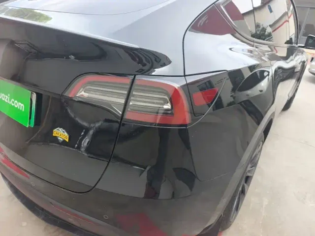 Tesla Model Y — Фото автомобиля 7