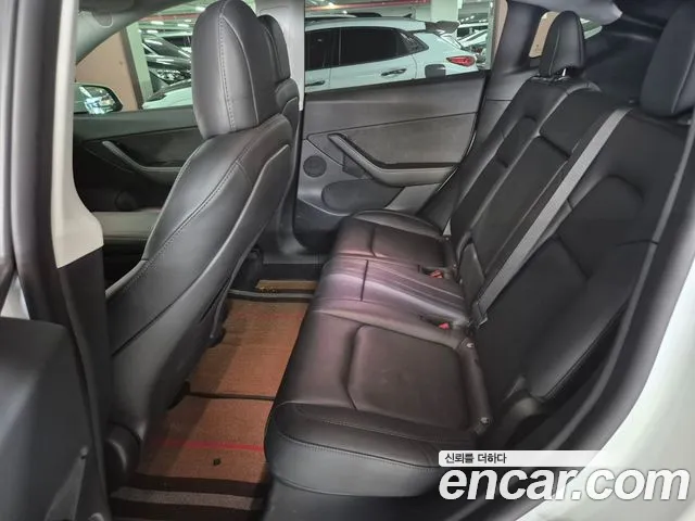 Tesla Model Y — Фото автомобиля 7