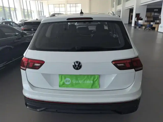 Volkswagen Tiguan L — Фото автомобиля 5