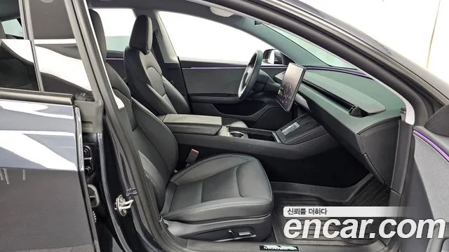 Tesla Model 3 — Фото автомобиля 11