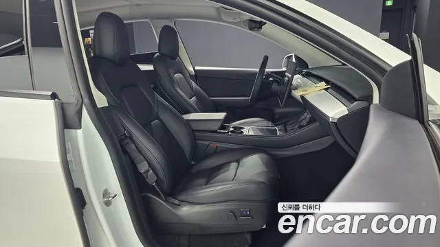 Tesla Model Y — Фото автомобиля 10