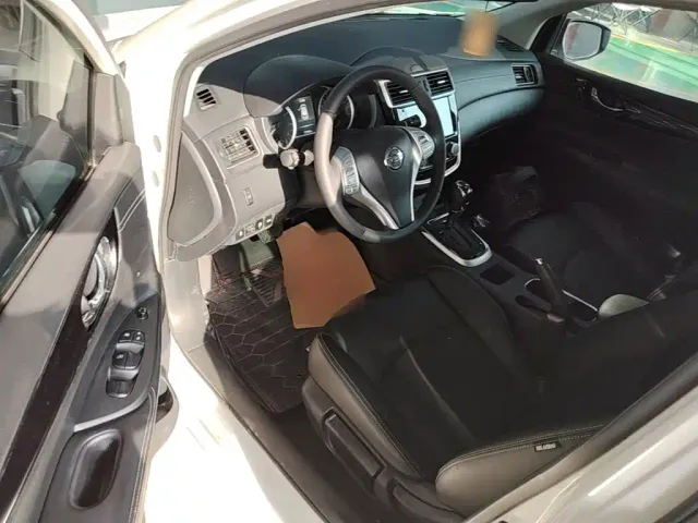 Nissan Tiida — Фото автомобиля 15