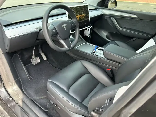 Tesla Model Y — Фото автомобиля 7