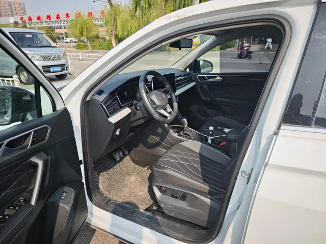 Volkswagen Tiguan L — Фото автомобиля 5