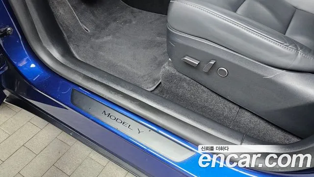 Tesla Model Y — Фото автомобиля 27