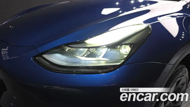Tesla Model Y — Фото автомобиля 7
