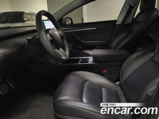 Tesla Model 3 — Фото автомобиля 8