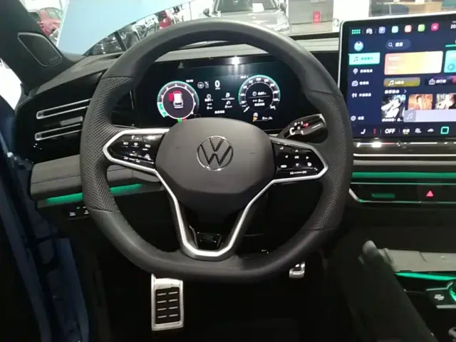 Volkswagen Tiguan L — Фото автомобиля 10