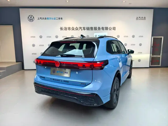 Volkswagen Tiguan L — Фото автомобиля 10