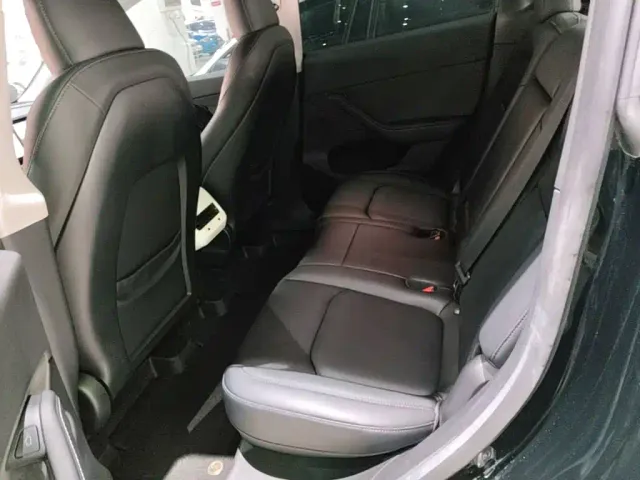 Tesla Model Y — Фото автомобиля 16
