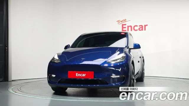 Tesla Model Y — Фото автомобиля 3