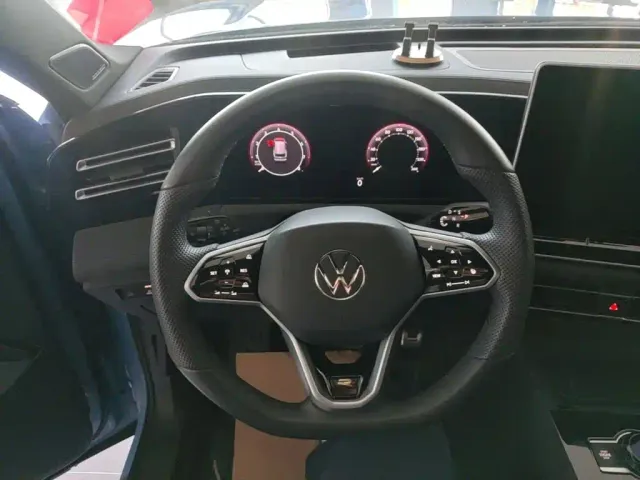 Volkswagen Tiguan L — Фото автомобиля 10
