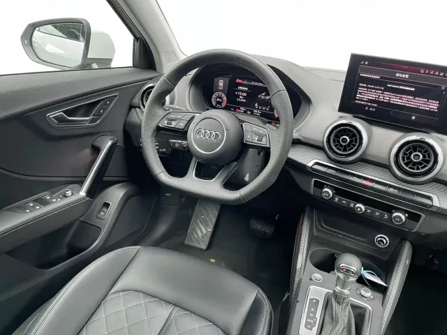 Audi Q2L — Фото автомобиля 13