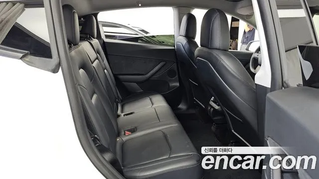 Tesla Model Y — Фото автомобиля 24