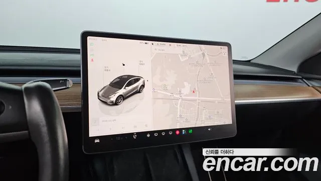 Tesla Model Y — Фото автомобиля 12