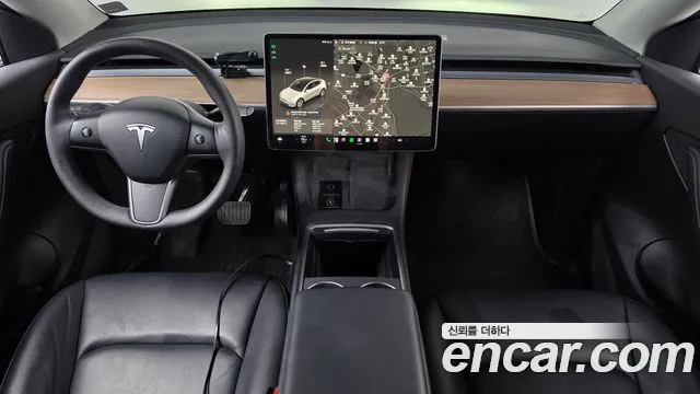 Tesla Model Y — Фото автомобиля 10