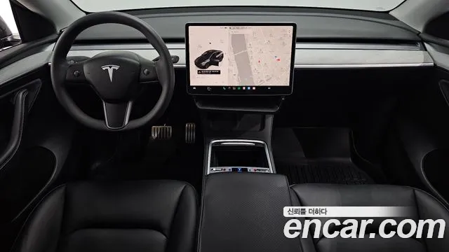 Tesla Model Y — Фото автомобиля 7
