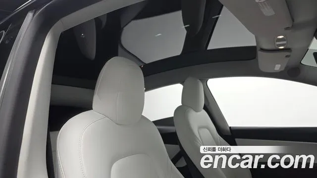 Tesla Model Y — Фото автомобиля 18