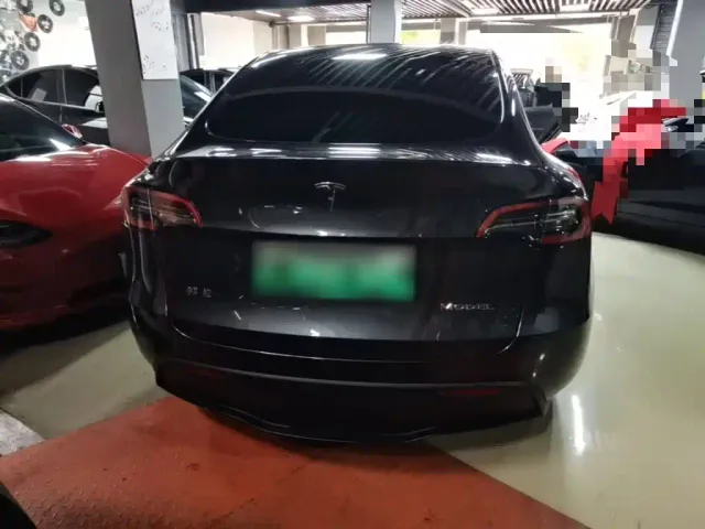 Tesla Model Y — Фото автомобиля 5