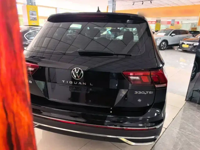 Volkswagen Tiguan L — Фото автомобиля 5