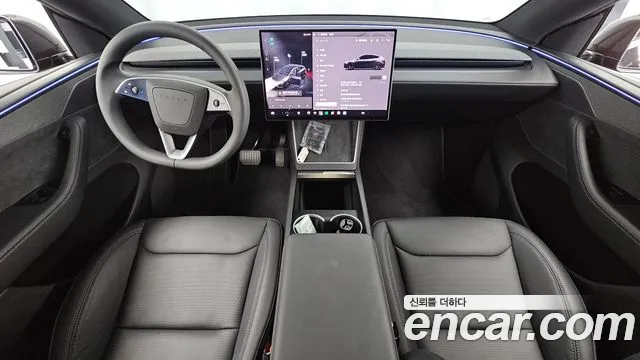 Tesla Model Y — Фото автомобиля 10