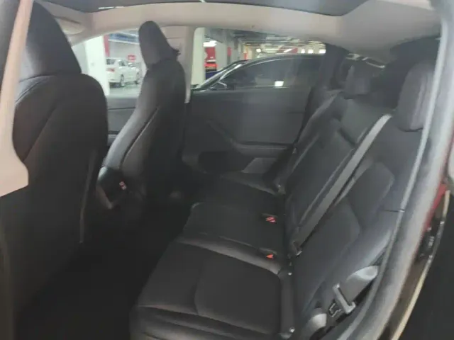 Tesla Model Y — Фото автомобиля 16