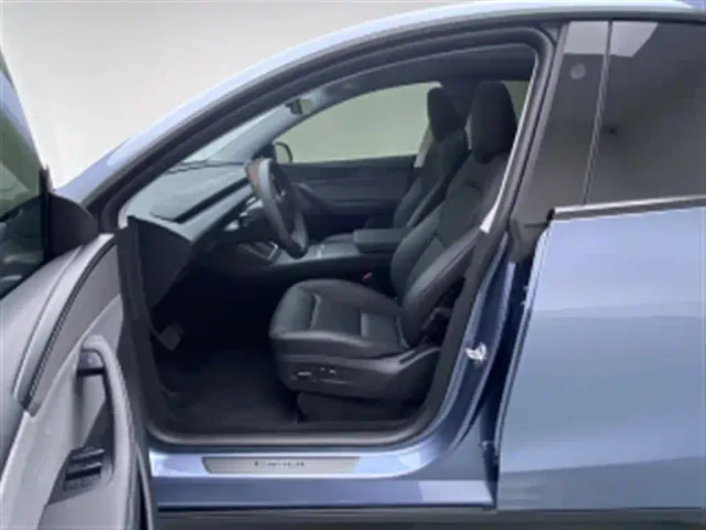 Tesla Model Y — Фото автомобиля 12
