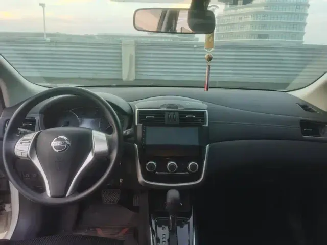 Nissan Tiida — Фото автомобиля 14