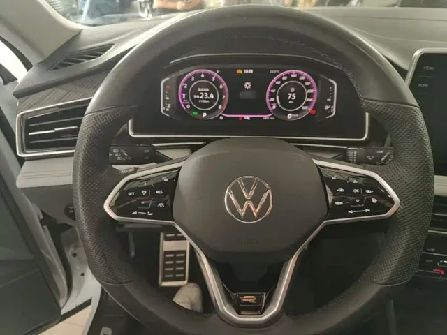 Volkswagen Tiguan L — Фото автомобиля 10