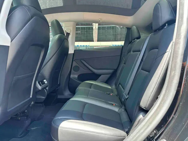 Tesla Model Y — Фото автомобиля 6