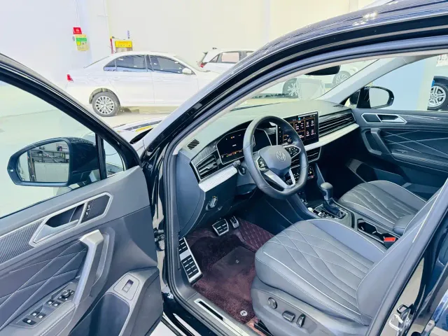 Volkswagen Tiguan L — Фото автомобиля 6