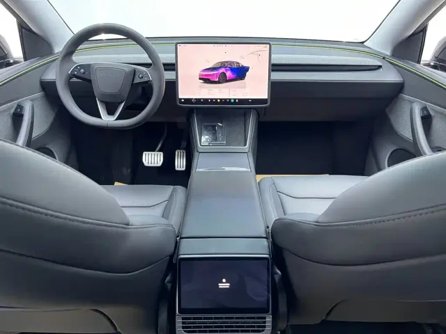 Tesla Model Y — Фото автомобиля 23