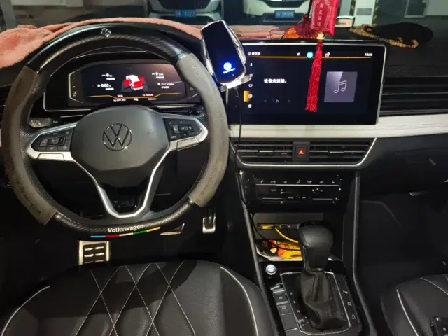 Volkswagen Tiguan L — Фото автомобиля 12