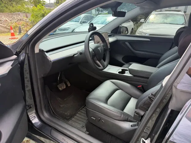 Tesla Model Y — Фото автомобиля 14