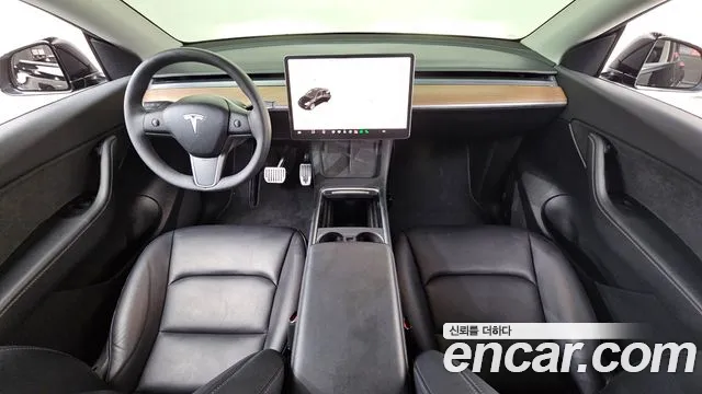 Tesla Model Y — Фото автомобиля 7