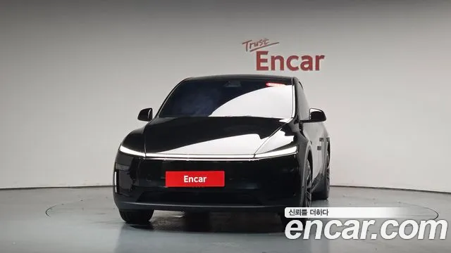 Tesla Model Y — Фото автомобиля 3