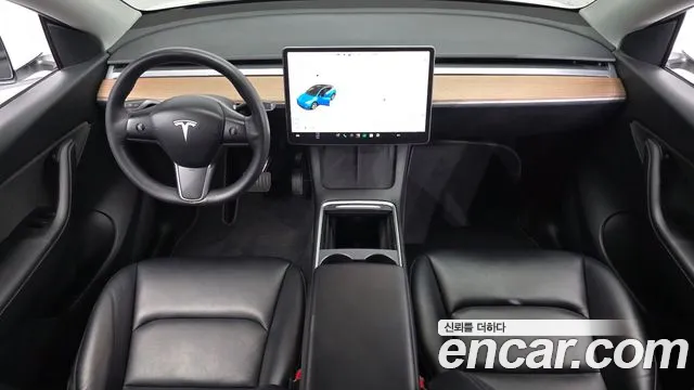 Tesla Model Y — Фото автомобиля 6