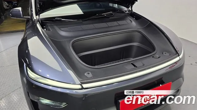 Tesla Model Y — Фото автомобиля 9