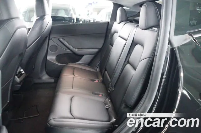 Tesla Model Y — Фото автомобиля 9