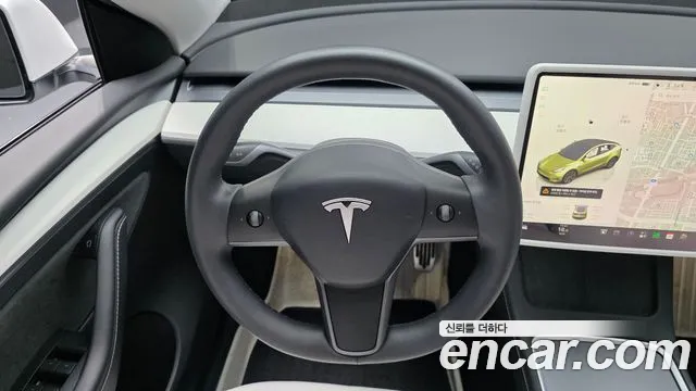 Tesla Model Y — Фото автомобиля 19