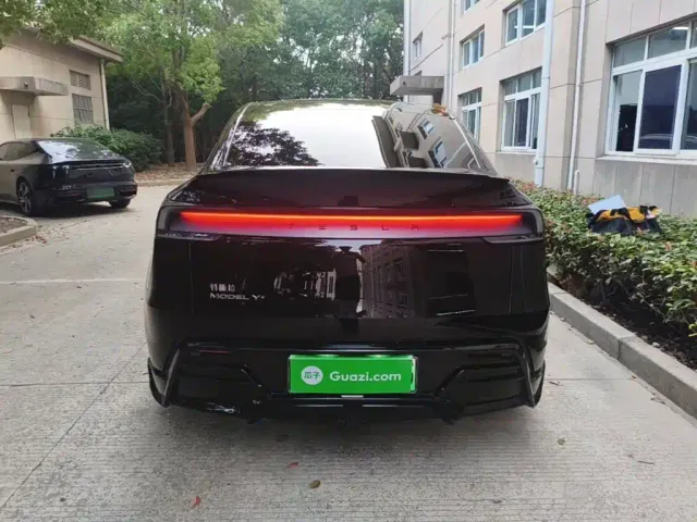 Tesla Model Y — Фото автомобиля 5