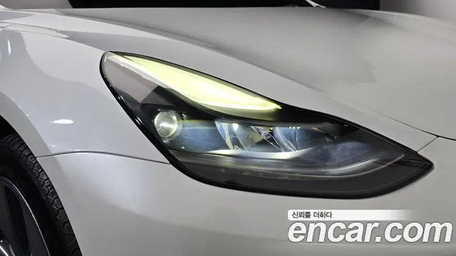 Tesla Model 3 — Фото автомобиля 7