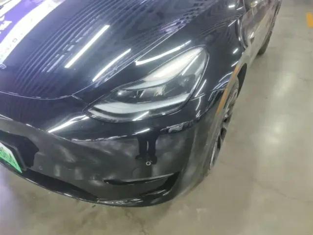 Tesla Model Y — Фото автомобиля 23