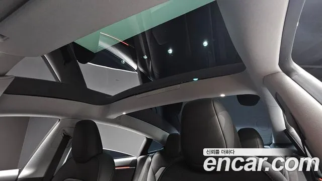 Tesla Model 3 — Фото автомобиля 15