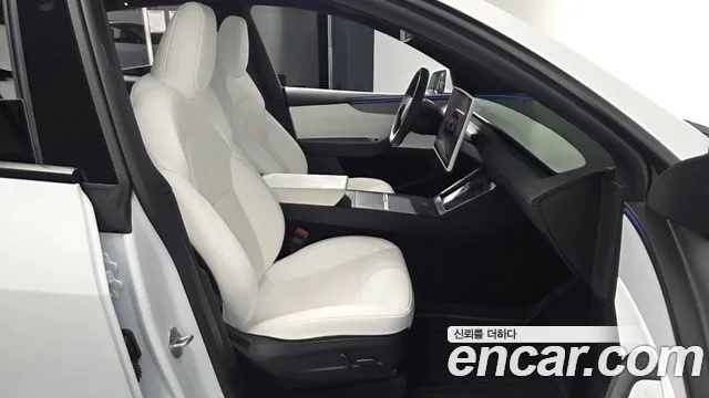 Tesla Model Y — Фото автомобиля 16