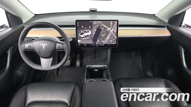Tesla Model Y — Фото автомобиля 6